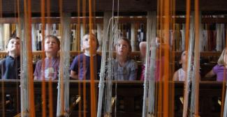 Visiter en famille les ateliers de Soierie Vivante à Lyon 4e : l'histoire des Canuts